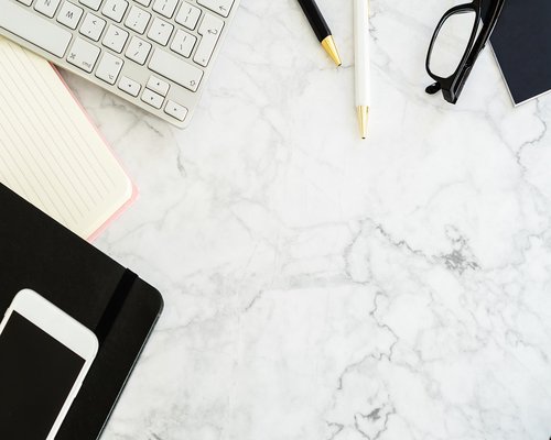 A clean personal digital working setup demonstrating safe and friendly space organization